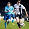 Kyle McAusland signs