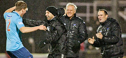 Jordan Moore goes to celebrate his goal with the bench