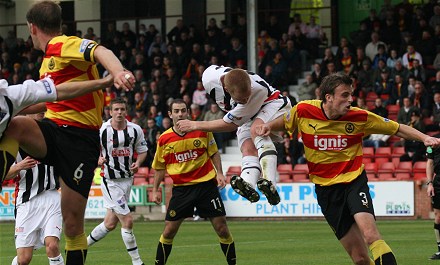 Greg Shields attempts header on goal Greg Shields attempts header on goal
