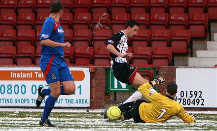 Ryan Esson rushes out at Dunfermline Ryan Esson rushes out at Dunfermline