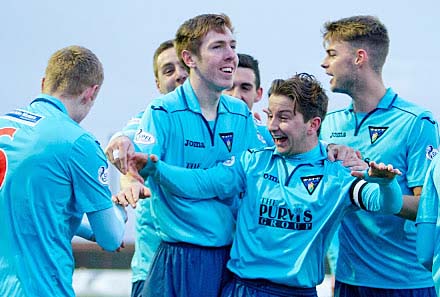 Josh celebrates with team mates