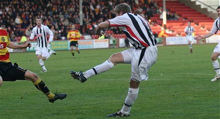 Iain Williamson fires on goal Iain Williamson fires on goal