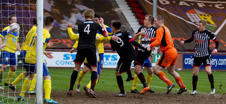 Danny Grainger hits the post