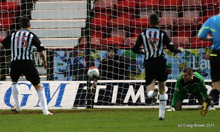Dunfermline keeper Chris Smith fails to hold Haber's shot