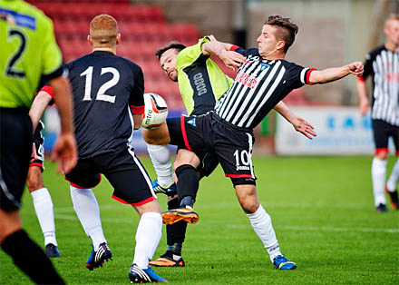 Josh Falkingham gets stuck in v Stranraer Josh Falkingham gets stuck in v Stranraer