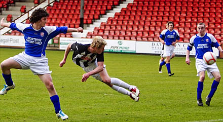 Blair Henderson sees his header saved Blair Henderson sees his header saved