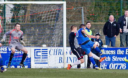 Grainger tries to keep out a third goal Grainger tries to keep out a third goal