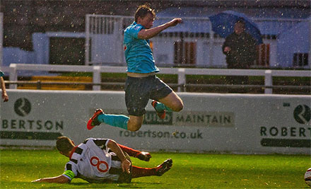 Jamie Duff slides into Jordan Moore