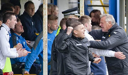 The bench celebrates the win The bench celebrates the win