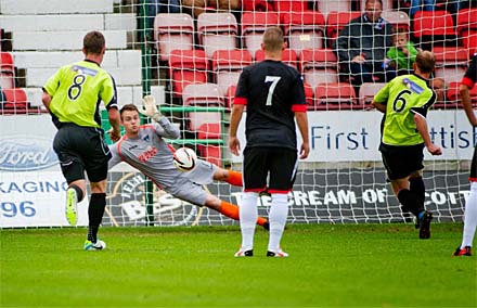 Ryan Scully saves Chris Aitken's penalty kick Ryan Scully saves Chris Aitken's penalty kick
