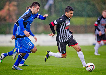 Faissal El Bakhtaoui tries to get away from Steven Bell Faissal El Bakhtaoui tries to get away from Steven Bell