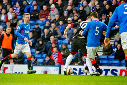 Ross Forbes tackled in the box Ross Forbes tackled in the box