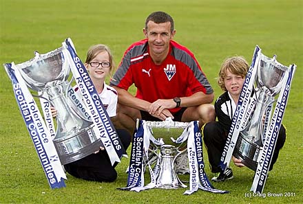 Jim McIntyre with the Scottish Communities Cup Jim McIntyre with the Scottish Communities Cup