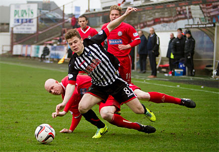 Alex Whittle goes down in challenge with Gerry McLauchlan Alex Whittle goes down in challenge with Gerry McLauchlan