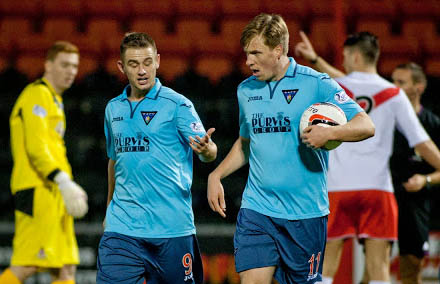 Ryan Wallace atempts to coax ball off Jordan Moore Ryan Wallace atempts to coax ball off Jordan Moore