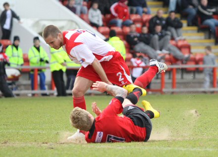 Willie Gibson is taken down by last man Tom Parratt Willie Gibson is taken down by last man Tom Parratt