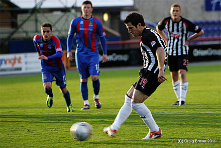 Liam Buchanan scores from the penalty spot
