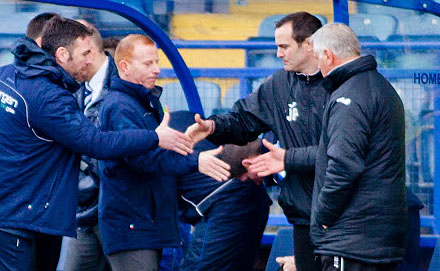Steve Aitken and Jim Jefferies shake hands Steve Aitken and Jim Jefferies shake hands