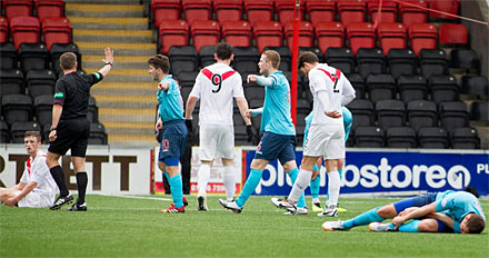 Stephen Husband lies felled as a free kick is awarded to Airdrie Stephen Husband lies felled as a free kick is awarded to Airdrie