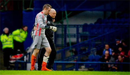 Ryan Scully is helped off by Kenny Murray Ryan Scully is helped off by Kenny Murray