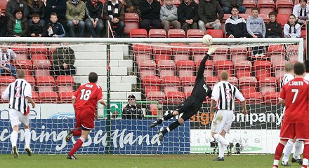 Paul Gallacher saves from Charlie Mulgrew Paul Gallacher saves from Charlie Mulgrew