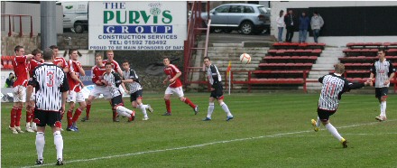 Willie Gibsons free kick goes over the top Willie Gibsons free kick goes over the top