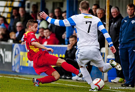 Josh Falkingham tackles Mortons Tony Wallace