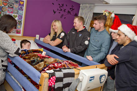 DAFC players visit CHAS DAFC players visit CHAS