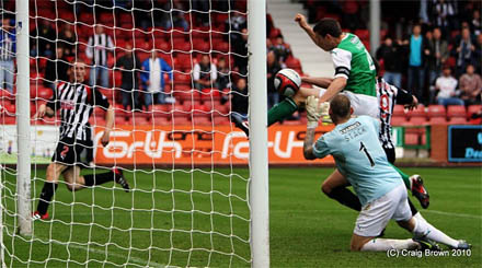 Paul Hanlon diverts the ball into his own net giving Hibs keeper Graham Stack no chance. Paul Hanlon diverts the ball into his own net giving Hibs keeper Graham Stack no chance.
