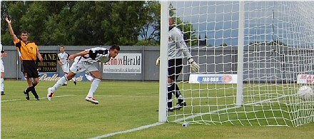 Steven Bell heads home the fifth Steven Bell heads home the fifth