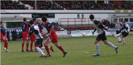 Andy Kirk`s free kick is blocked Andy Kirk`s free kick is blocked