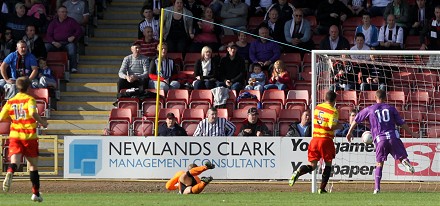 Andy Kirk scores the second goal at Firhill
