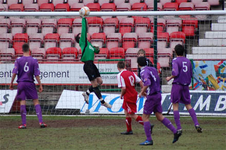 Ryan Goodfellow tips cross over his crossbar