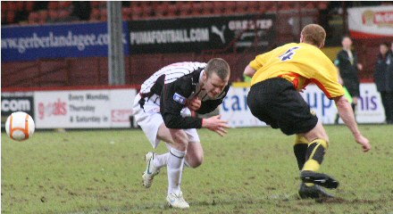 Andy Kirk feels a challenge from Greg Shields Andy Kirk feels a challenge from Greg Shields