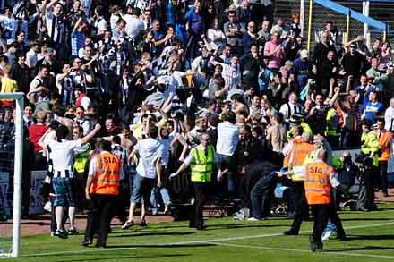 Pars fans celebrate the second goal at Greenock Pars fans celebrate the second goal at Greenock
