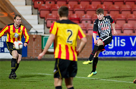 Alex Whittle fires at Thistle goal Alex Whittle fires at Thistle goal