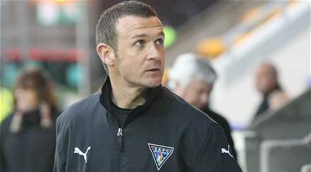 Jim McIntyre looks to see who's watching his side