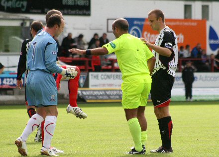 Referee Anthony Law is carried off Referee Anthony Law is carried off