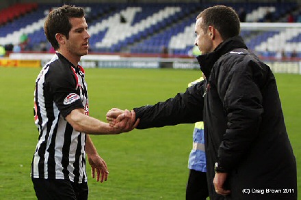 Liam Buchanan is thanked by Jim McIntyre