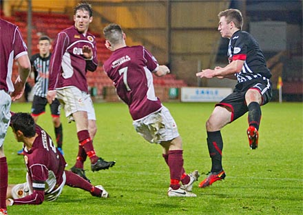 Allan Smith shoots in the winner