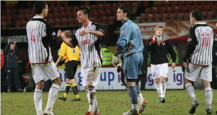 Cardle is congratulated for his hattrick Cardle is congratulated for his hattrick