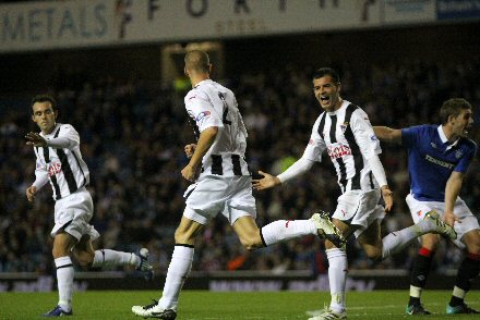 Calum Woods celebrates goal at Ibrox Calum Woods celebrates goal at Ibrox