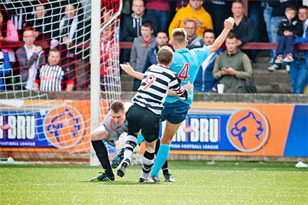 Kevin Turner moves Kerr Young out of the way Kevin Turner moves Kerr Young out of the way