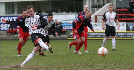 Andy Kirk scores from the penalty spot Andy Kirk scores from the penalty spot