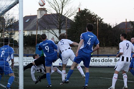 Neil McGregor attacks a corner v Montrose Neil McGregor attacks a corner v Montrose